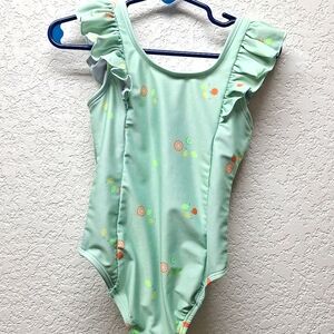 3T swimsuit green with fruits on it.